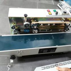 Máy hàn kín mép túi liên tục