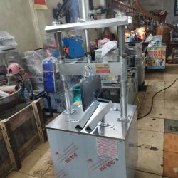 Máy mổ đầu heo