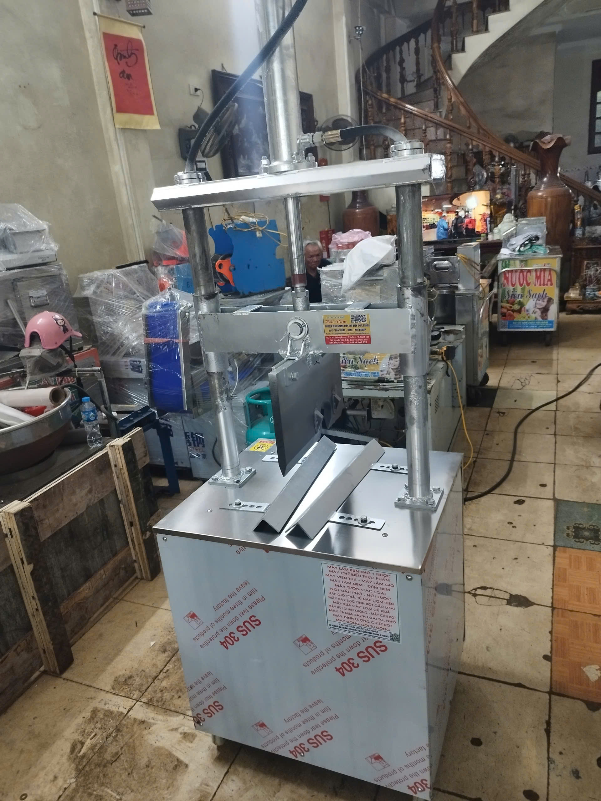 Máy mổ đầu heo